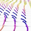 A digital illustration of cell cilia arranged in rows and in different stages of waving in place.