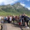 students in front of mountains