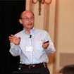 Man standing with a clicker in his left hand