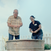 four people with goggles in front of a bin